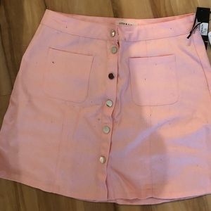 Pink denim skirt buttoned